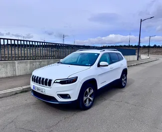 Front view of a rental Jeep Cherokee in Tbilisi, Georgia ✓ Car #15667. ✓ Automatic TM ✓ 0 reviews.