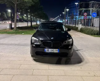 Front view of a rental BMW X1 in Tirana, Albania ✓ Car #15739. ✓ Automatic TM ✓ 0 reviews.