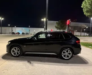 BMW X1 2013 car hire in Albania, featuring ✓ Diesel fuel and  horsepower ➤ Starting from 35 EUR per day.