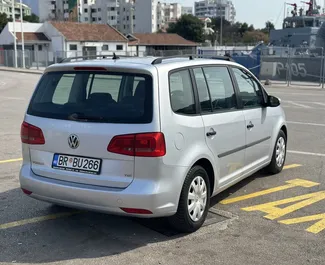 Volkswagen Touran 2013 car hire in Montenegro, featuring ✓ Diesel fuel and 105 horsepower ➤ Starting from 40 EUR per day.