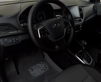 Hyundai Accent 2021 tillgänglig för uthyrning i Almaty, med en körsträckegräns på 250 km/dag.