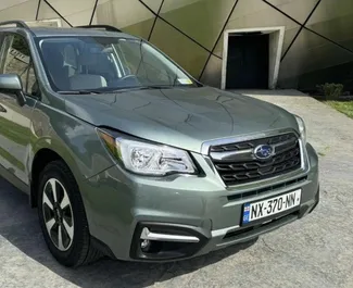 Priekinė automobilio, kurį nuomojate Subaru Forester Tbilisyje, Gruzija vaizdas ✓ Automobilis #15694. ✓ Pavarų dėžė Automatinis TM ✓ Atsiliepimai 0.