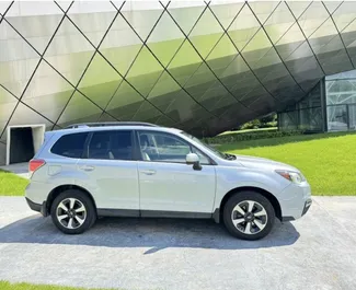 Petrol 2.5L engine of Subaru Forester 2017 for rental in Tbilisi.