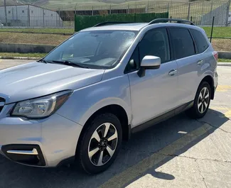 Přední pohled na pronájem Subaru Forester v Tbilisi, Georgia ✓ Auto č. 15699. ✓ Převodovka Automatické TM ✓ Recenze 0.