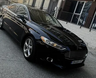 Ford Fusion Sedan 2015 для аренды в Тбилиси. Лимит пробега не ограничен.