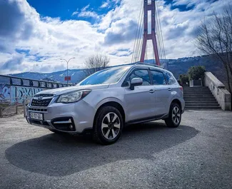 Přední pohled na pronájem Subaru Forester v Tbilisi, Georgia ✓ Auto č. 15679. ✓ Převodovka Automatické TM ✓ Recenze 0.