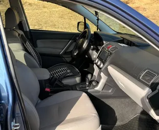 Petrol 2.5L engine of Subaru Forester Limited 2016 for rental in Tbilisi.