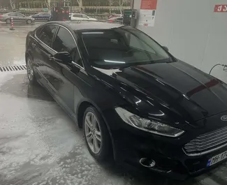 Nomas automašīnas priekšskats Ford Mondeo Tbilisi, Gruzija ✓ Automašīna #15789. ✓ Pārnesumu kārba Automātiskais TM ✓ Atsauksmes 0.