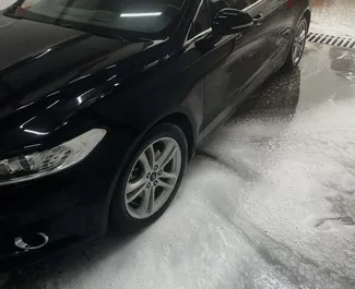 Ford Mondeo 2016 automašīnas noma Gruzijā, iezīmes ✓ Benzīns degviela un 160 zirgspēki ➤ Sākot no 140 GEL dienā.