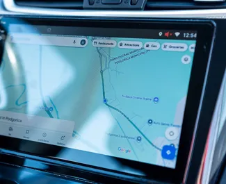 Interiøret til Nissan Qashqai til leie i Montenegro. En flott 5-seters bil med Automatisk-gir.