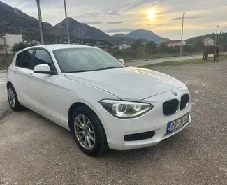 Front view of a rental BMW 116d at Podgorica Airport, Montenegro ✓ Car #15719. ✓ Automatic TM ✓ 0 reviews.