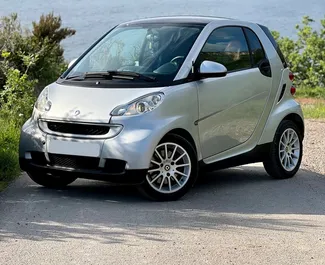 Smart Fortwo 2010 car hire in Montenegro, featuring ✓ Petrol fuel and 70 horsepower ➤ Starting from 12 EUR per day.