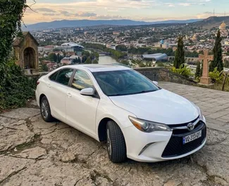 Front view of a rental Toyota Camry in Tbilisi, Georgia ✓ Car #16031. ✓ Automatic TM ✓ 0 reviews.