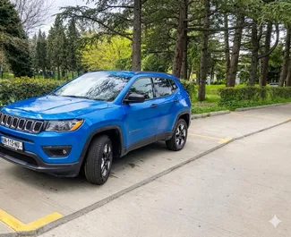 Front view of a rental Jeep Compass in Tbilisi, Georgia ✓ Car #16071. ✓ Automatic TM ✓ 0 reviews.