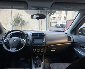 Interior de Mitsubishi Outlander Sport para alquilar en Georgia. Un gran coche de 4 plazas con transmisión Automático.