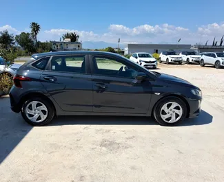 Hyundai i20 2025 available for rent at Antalya Airport, with 250 km/day mileage limit.