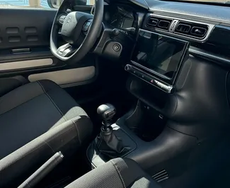 Interior of Citroen C3 for hire in Montenegro. A Great 5-seater car with a Manual transmission.