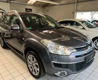 Front view of a rental Citroen C-Crosser at Tirana airport, Albania ✓ Car #10119. ✓ Manual TM ✓ 0 reviews.