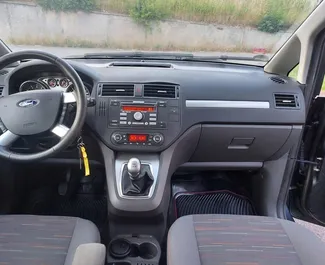 Front view of a rental Ford C-Max at Tirana airport, Albania ✓ Car #11928. ✓ Manual TM ✓ 0 reviews.