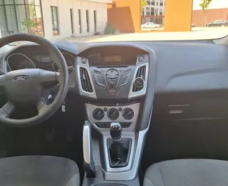 Front view of a rental Ford Focus at Tirana airport, Albania ✓ Car #11923. ✓ Manual TM ✓ 0 reviews.