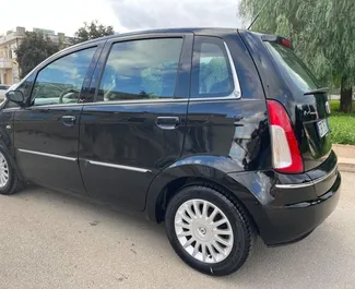 Front view of a rental Lancia Musa at Tirana airport, Albania ✓ Car #9995. ✓ Manual TM ✓ 1 reviews.