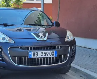 Front view of a rental Peugeot 4007 at Tirana airport, Albania ✓ Car #16093. ✓ Manual TM ✓ 0 reviews.