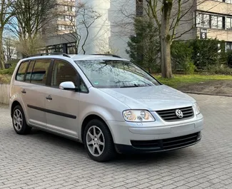 Front view of a rental Volkswagen Touran at Tirana airport, Albania ✓ Car #10006. ✓ Manual TM ✓ 0 reviews.