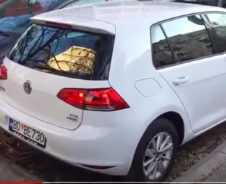 Front view of a rental Volkswagen Golf 7 at Podgorica Airport, Montenegro ✓ Car #16216. ✓ Automatic TM ✓ 0 reviews.