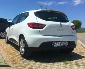 Front view of a rental Renault Clio 4 at Podgorica Airport, Montenegro ✓ Car #16221. ✓ Manual TM ✓ 0 reviews.