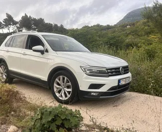 Front view of a rental Volkswagen Tiguan at Podgorica Airport, Montenegro ✓ Car #16218. ✓ Automatic TM ✓ 0 reviews.