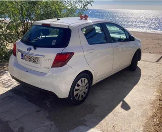 Rendiauto esivaade Toyota Yaris Podgorica lennujaamas, Montenegro ✓ Auto #16210. ✓ Käigukast Automaatne TM ✓ Arvustused 0.
