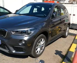 Auto rentimine BMW X1 #15686 Automaatne Podgorica lennujaamas, varustatud 1,5L mootoriga ➤ Yanlt Montenegros.