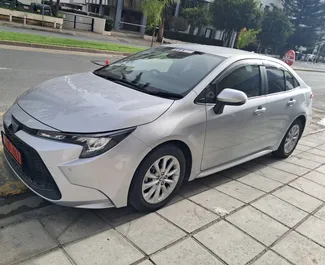 Toyota Corolla Sedan 2024 car hire in Cyprus, featuring ✓ Hybrid fuel and 140 horsepower ➤ Starting from 30 EUR per day.