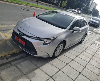 Hybrid 1.8L engine of Toyota Corolla Sedan 2024 for rental in Limassol.