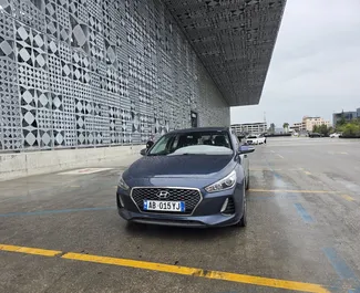 Priekinė automobilio, kurį nuomojate Hyundai i30 Tiranos oro uoste, Albanija vaizdas ✓ Automobilis #16279. ✓ Pavarų dėžė Automatinis TM ✓ Atsiliepimai 0.