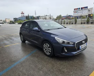 Hyundai i30 2019 automobilio nuoma Albanijoje, savybės ✓ Benzinas degalai ir 99 arklio galios ➤ Nuo 25 EUR per dieną.
