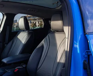 Pronájem auta Ford Mustang Mach E 2023 v Gruzii, s palivem Elektřina a výkonem 330 koní ➤ Cena od 135 GEL za den.