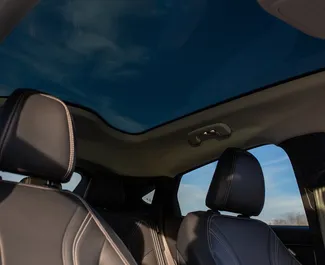 Pronájem Ford Mustang Mach E. Auto typu Prémiová, Luxusní, SUV k pronájmu v Gruzii ✓ Vklad 560 GEL ✓ Možnosti pojištění: TPL, CDW, SCDW, FDW, Cestující, Krádež.