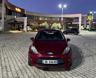 Nomas automašīnas priekšskats Ford Fiesta Tirānā, Albānija ✓ Automašīna #16445. ✓ Pārnesumu kārba Rokasgrāmata TM ✓ Atsauksmes 0.