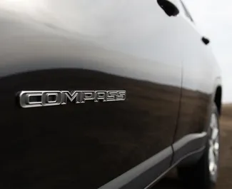 Petrol 2.0L engine of Jeep Compass 2024 for rental in Tbilisi.
