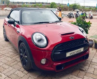 Front view of a rental Mini Cooper at Goa Airport, Goa ✓ Car #16177. ✓ Automatic TM ✓ 0 reviews.