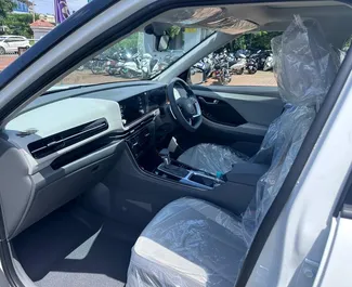 Front view of a rental Toyota Innova at Goa Airport, Goa ✓ Car #16175. ✓ Automatic TM ✓ 0 reviews.