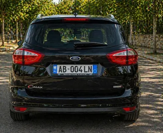 Nomas automašīnas priekšskats Ford C-Max pie Tirānas lidostas, Albānija ✓ Automašīna #16309. ✓ Pārnesumu kārba Automātiskais TM ✓ Atsauksmes 0.