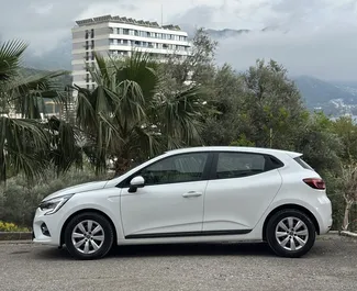 Front view of a rental Renault Clio 5 in Becici, Montenegro ✓ Car #16382. ✓ Automatic TM ✓ 0 reviews.