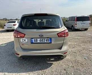 Petrol 1.6L engine of Ford B-Max 2015 for rental at Tirana airport.