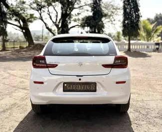 Suzuki Baleno 2026 car hire in Goa, featuring ✓ Petrol fuel and 89 horsepower ➤ Starting from 23 USD per day.