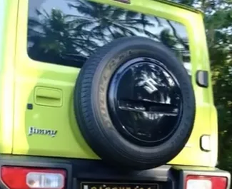Front view of a rental Suzuki Jimny at Goa Airport, Goa ✓ Car #16189. ✓ Automatic TM ✓ 0 reviews.