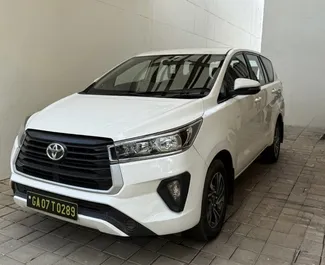 Toyota Innova rental. Comfort, Crossover, Minivan Car for Renting in Goa ✓ Deposit of 60 USD ✓ TPL insurance options.