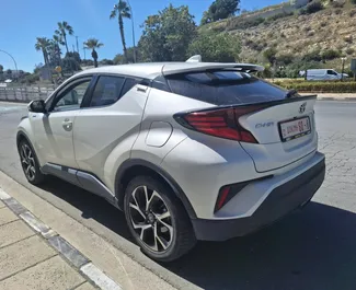 Toyota C-HR nuoma. Ekonomiškas, Komfortiškas, Krosas automobilis nuomai Kipre ✓ Depozitas 500 EUR ✓ Draudimo pasirinkimai: TPL, CDW, SCDW, Vagystė, Jaunimas.