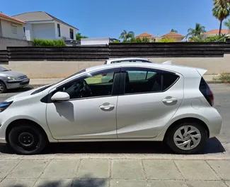 Toyota Aqua nuoma. Ekonomiškas automobilis nuomai Kipre ✓ Depozitas 100 EUR ✓ Draudimo pasirinkimai: TPL, CDW, SCDW, Vagystė, Jaunimas.
